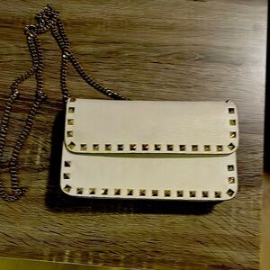 Mint condition! White and silver studs! Bought brand new! Made in Italy!